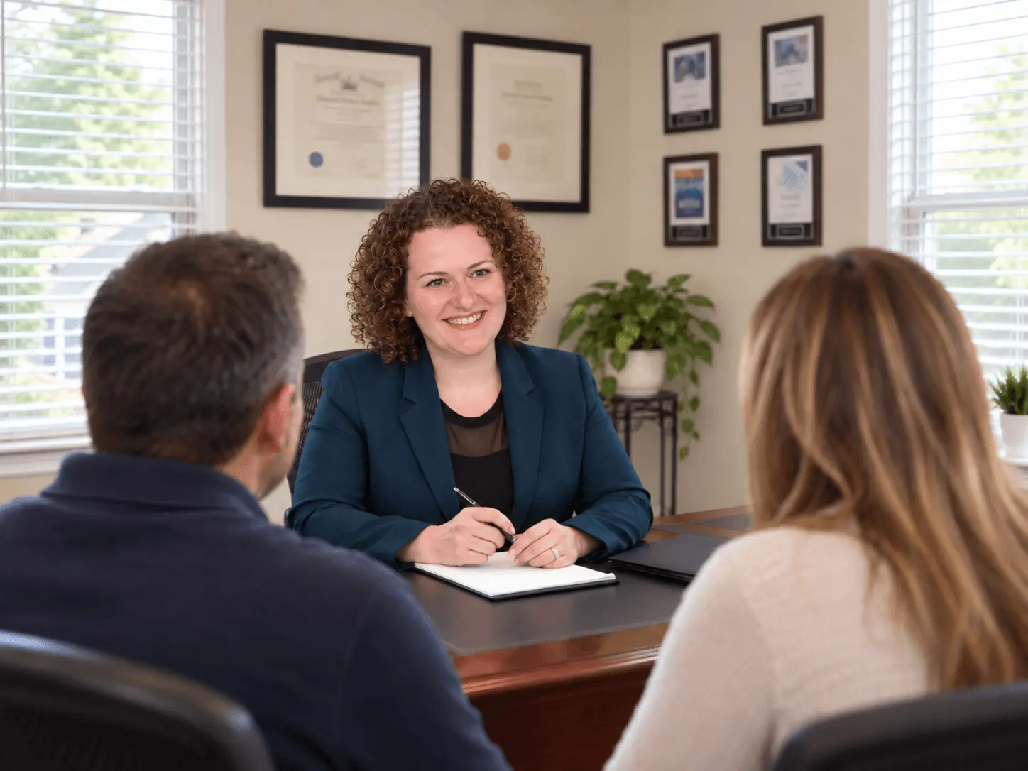 Ann Fabrikant meeting with clients at Fabrikant Law